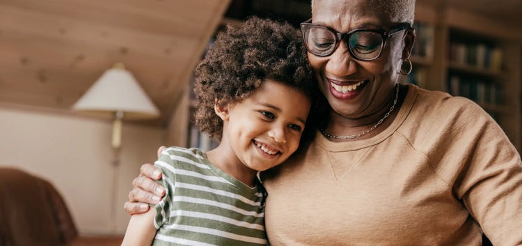 Image of an older woman hugging a child (not actual patients)